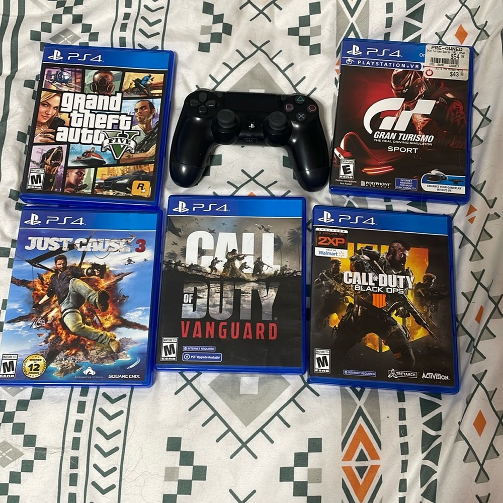 Playstation 4 controller and 5 games